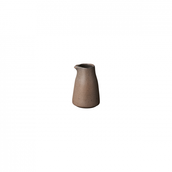 Handcrafted ceramic jug with a smooth, earthy finish on a black background.