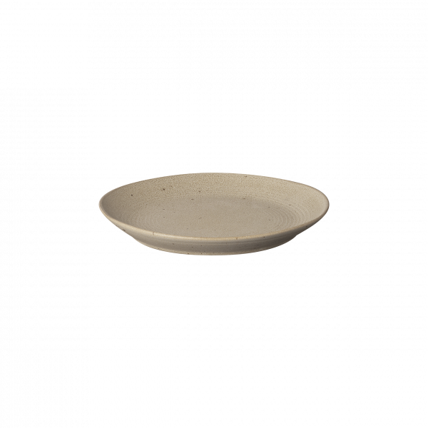 Neutrale Keramikplatte mit strukturiertem Design vor einem schwarzen Hintergrund.
