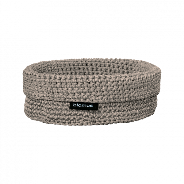 Stylish beige crochet storage basket by Blomus for home organization.