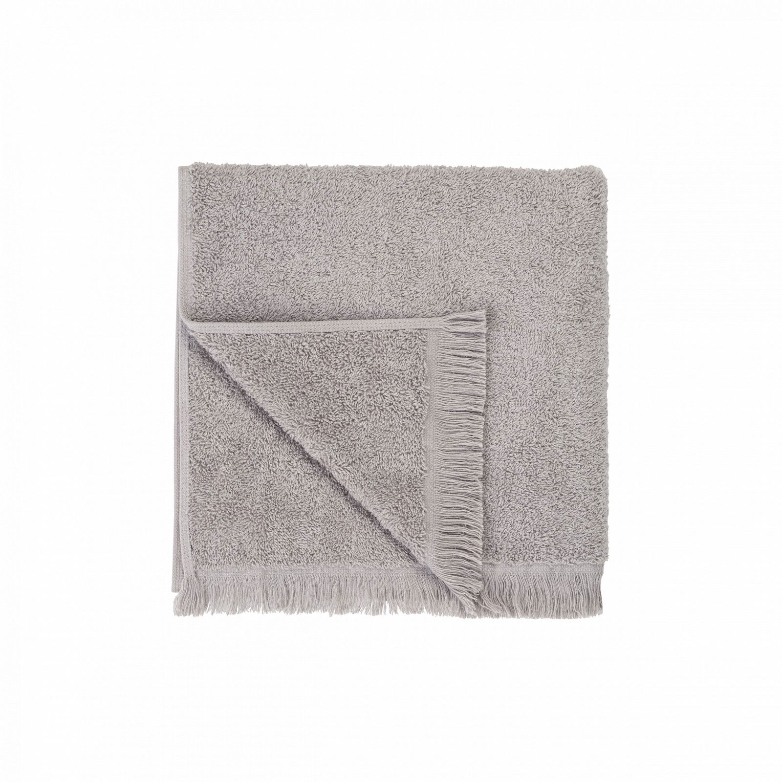 Soft gray towel with fringed edges, perfect for adding comfort to any bathroom decor.