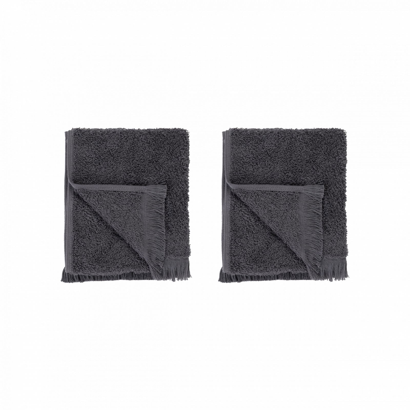 Two plush gray towels neatly folded on a black background.