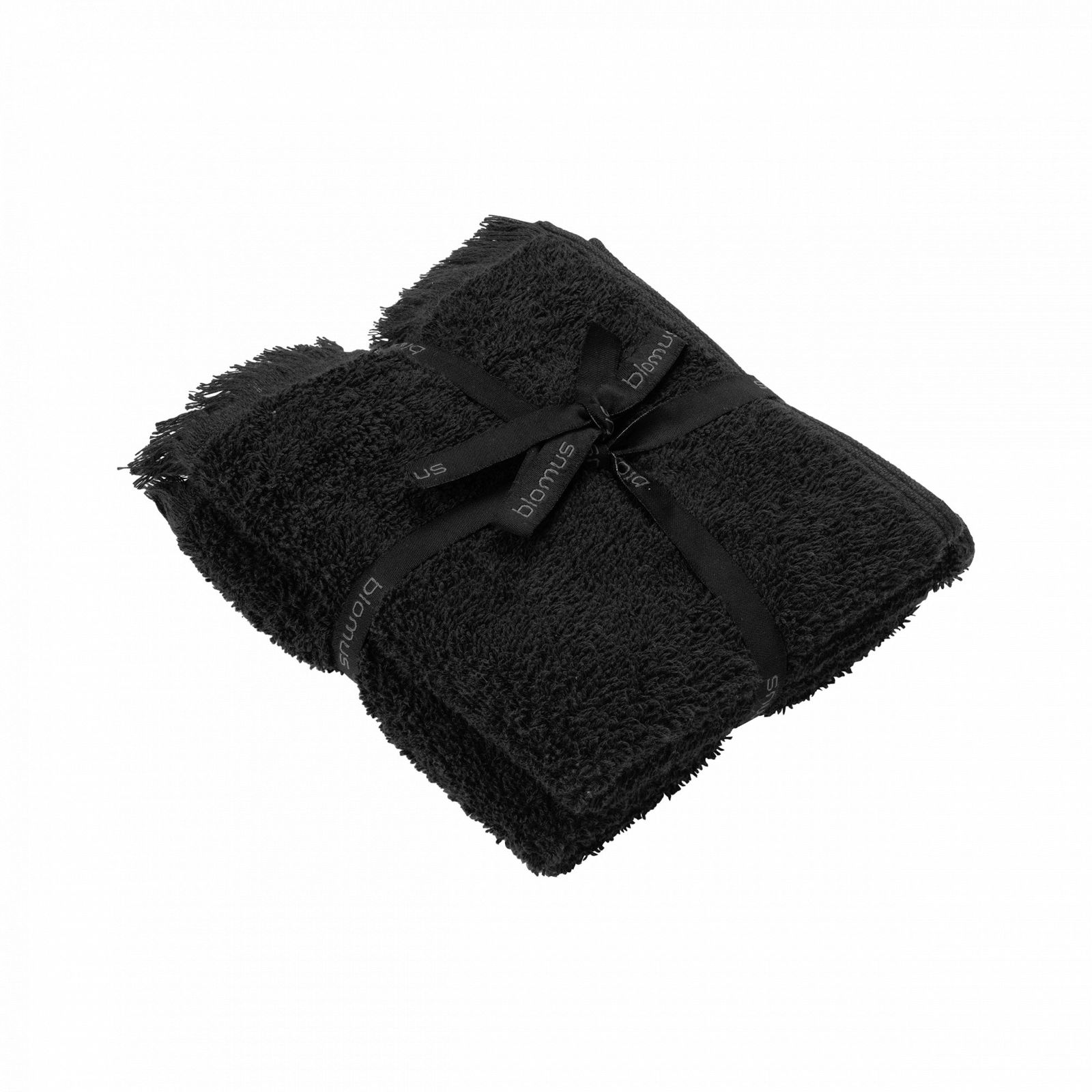 Soft black towel set elegantly tied with a ribbon, perfect for luxury bath experiences.