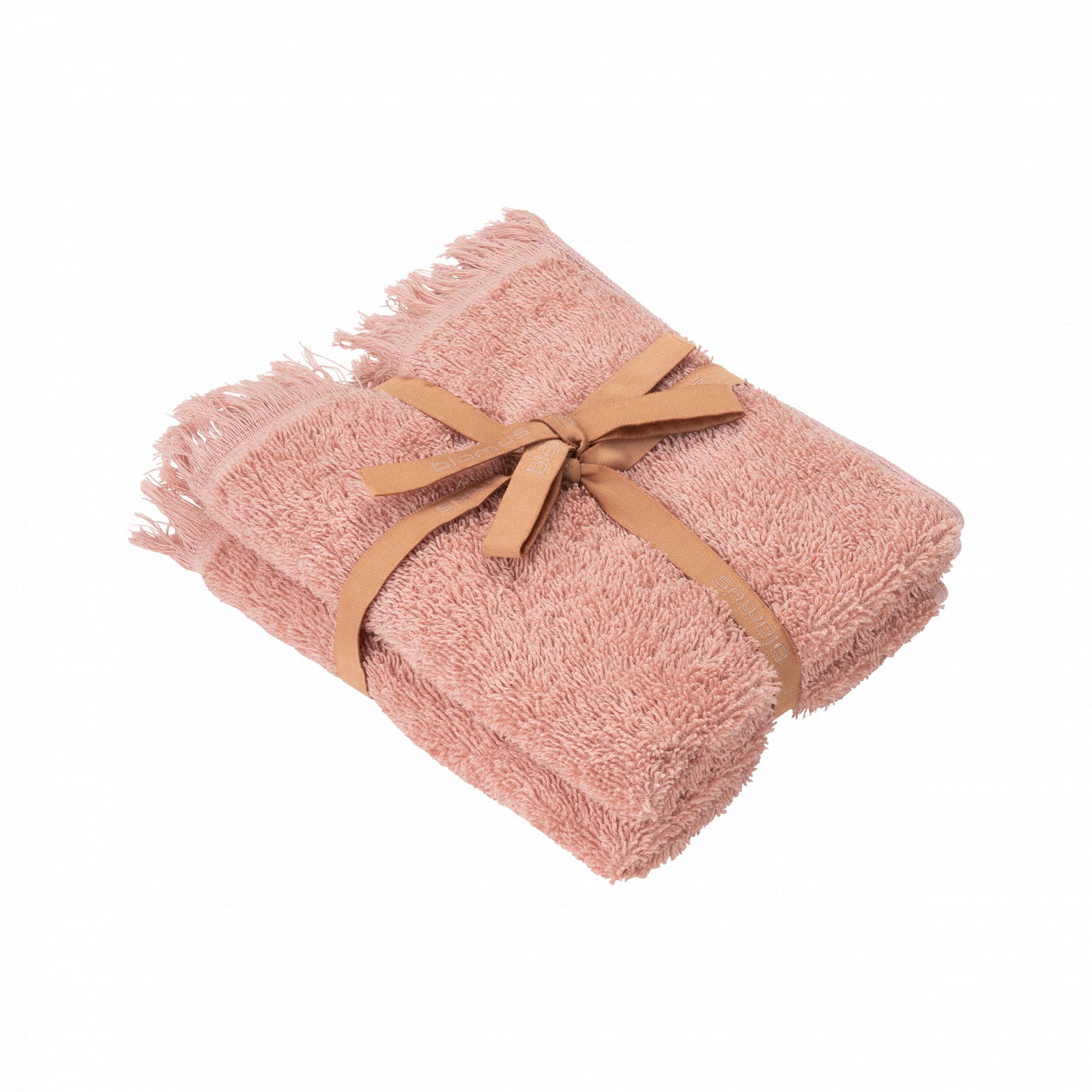 Soft pink towel neatly rolled and tied with a brown ribbon on a black background.