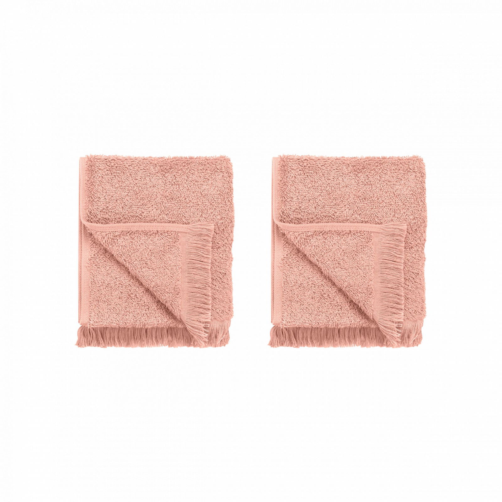 Two plush, coral-colored bath towels neatly folded and displayed on a black background.