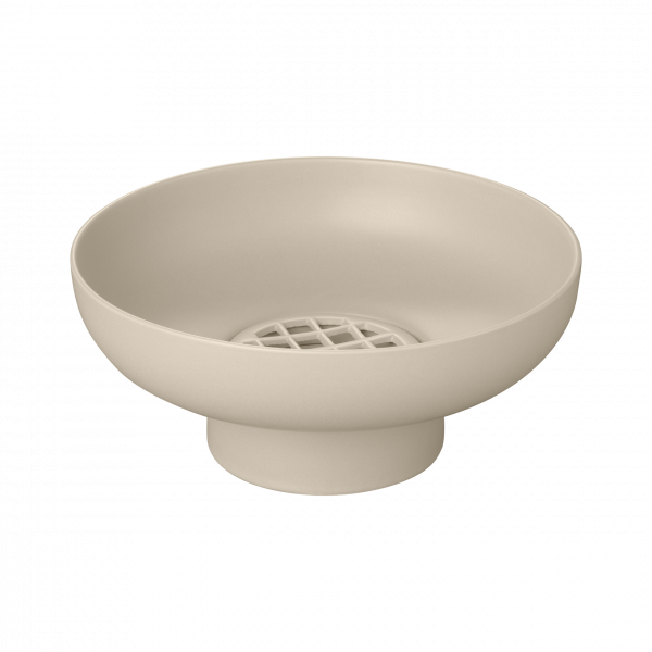 Minimalist beige bowl with a perforated base for drainage, perfect for modern home decor.