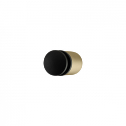 Sleek black and gold makeup sponge for flawless foundation application.