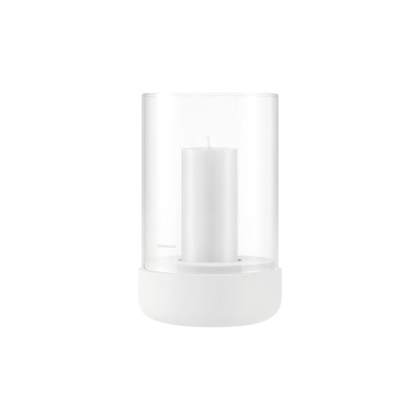 Minimalist clear candle holder with a white candle inside, perfect for home decor.