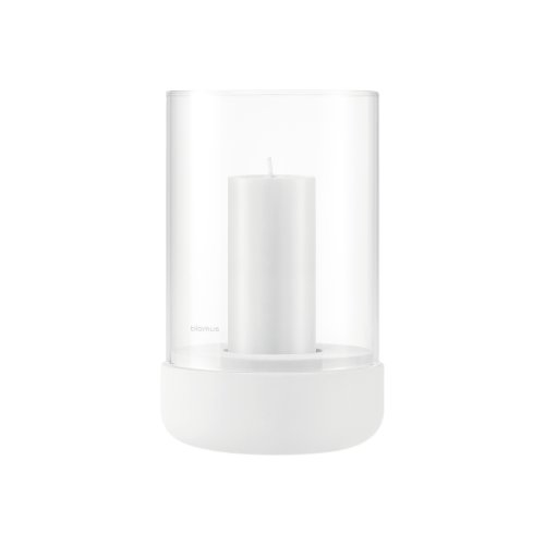 Minimalist clear candle holder with a white candle inside, perfect for home decor.