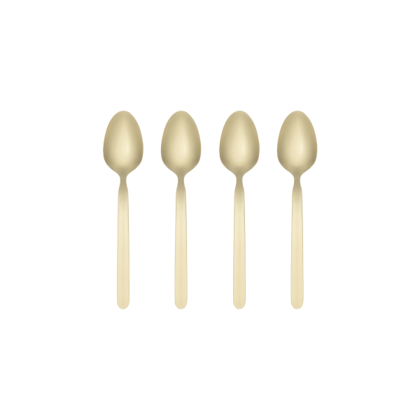 Set of four elegant gold spoons on a black background for stylish dining.