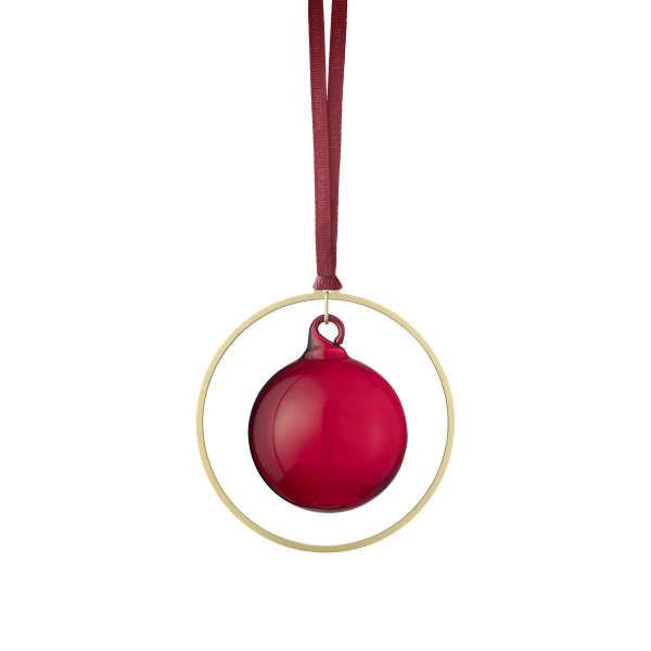 Red Christmas ornament hanging in a gold ring on a black background.