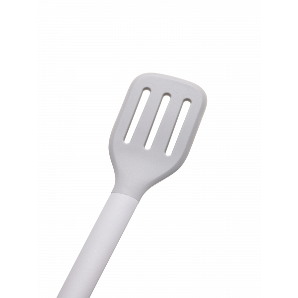 White plastic spatula with slotted head for cooking and flipping food.