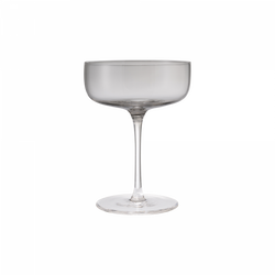 Elegant crystal coupe glass on a white background for cocktails and drinks.