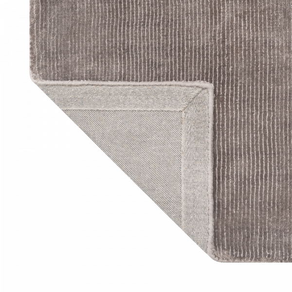 Gray textured area rug with a clean edge detail, adding elegance to any room.