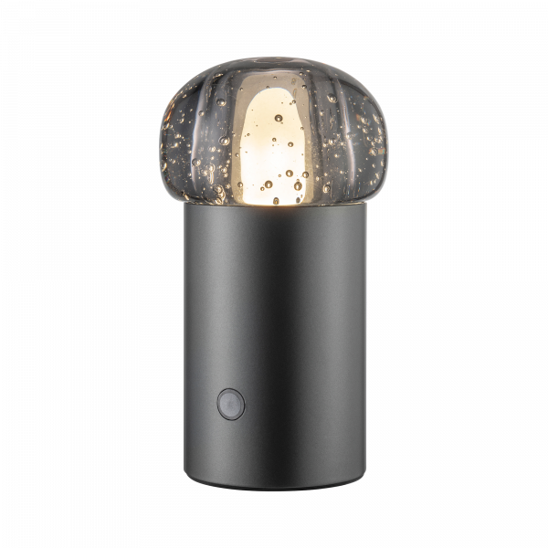 Moderne schwarze Tischlampe mit einem dekorativen Glasschirm und warmem Lichtschein.