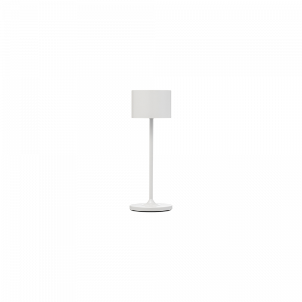 Moderne weiße Tischlampe mit einem schlanken Design und einem zylindrischen Schirm für elegantes Licht.