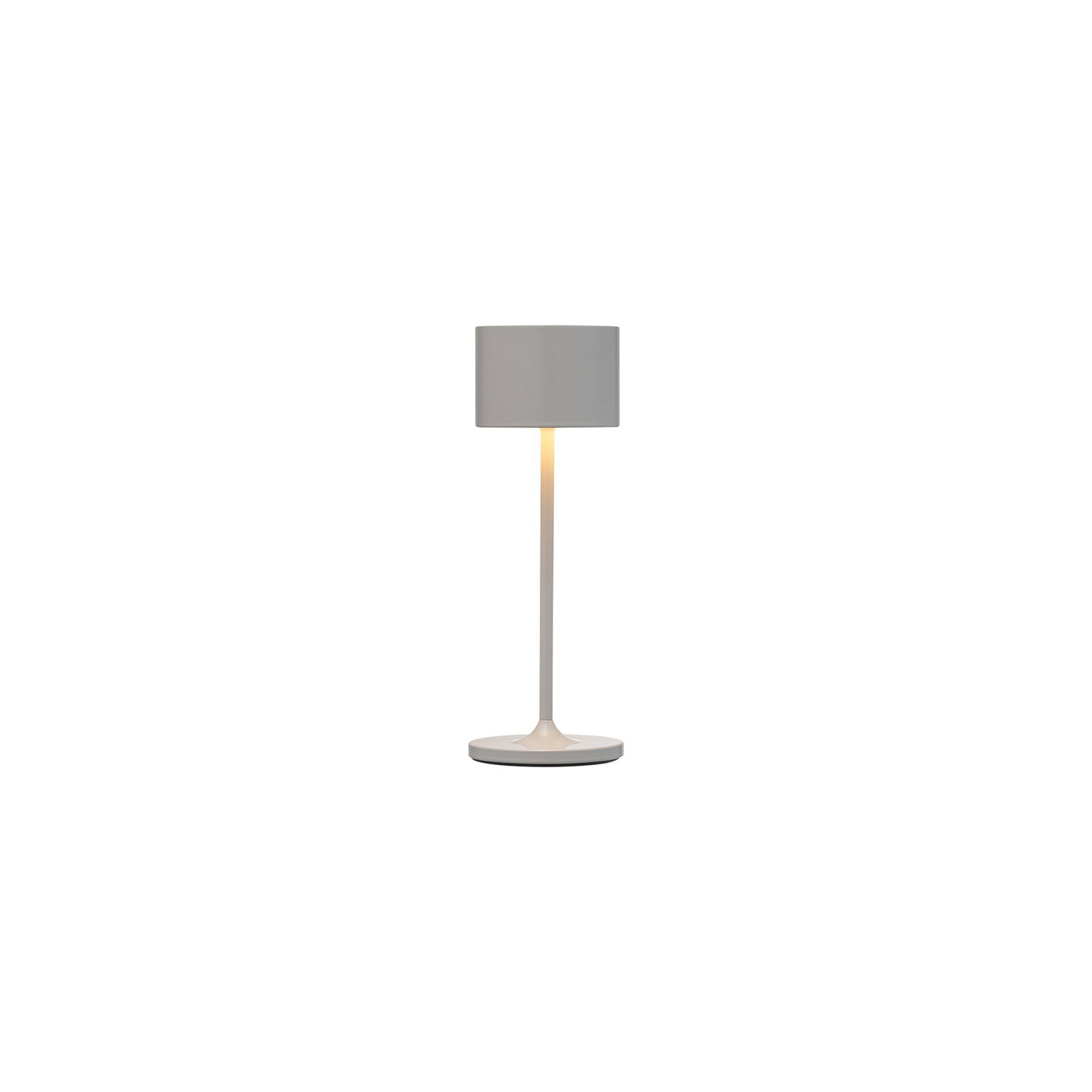 Moderne weiße Tischlampe mit einem zylindrischen Schirm und einem runden Fuß.