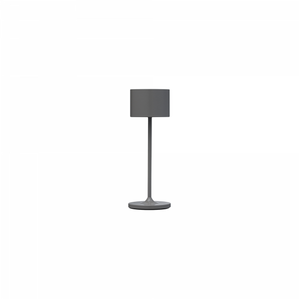 Moderne graue Tischlampe mit einem zylindrischen Schirm und einem schlanken Fuß für stilvolle Beleuchtung.