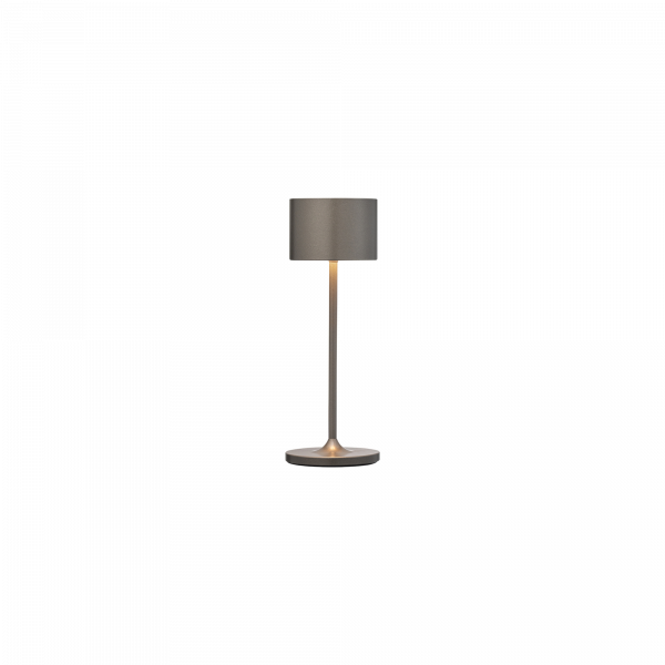 Moderne Tischlampe mit sleekem Design und sanft grauem Schirm, ideal für jede Einrichtung.