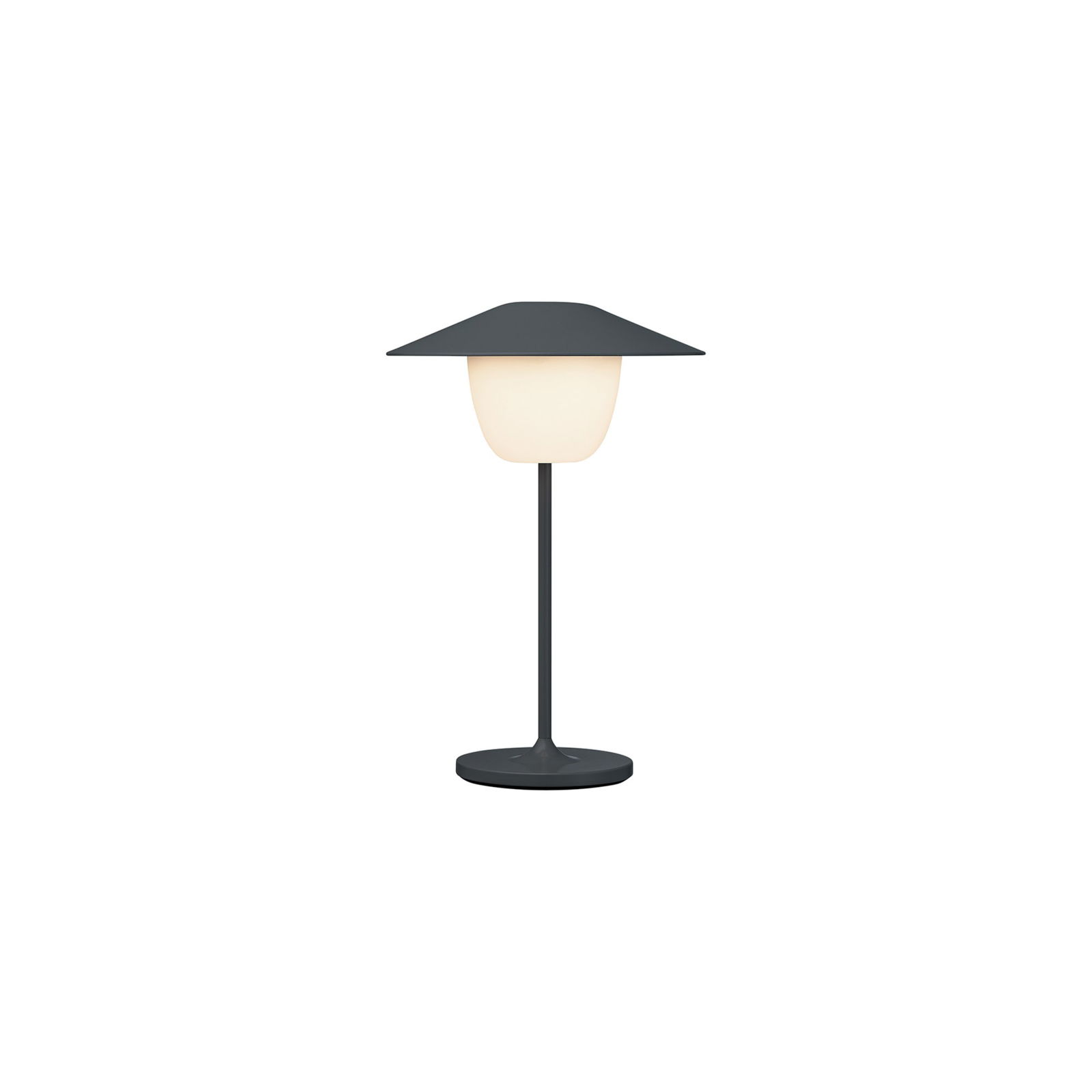 Moderne Tischlampe mit minimalistischem Design und sanft leuchtendem Schirm.