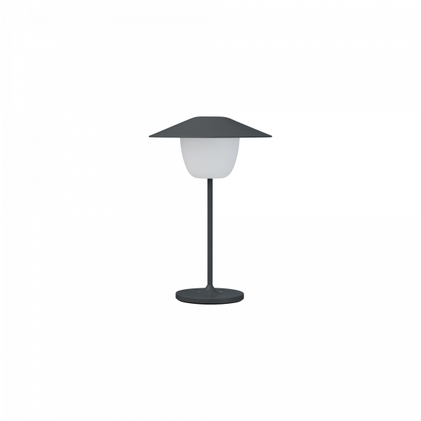 Moderne graue Tischlampe mit elegantem Design und einem satinierten Glasschirm.