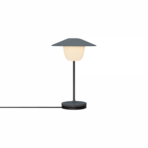 Moderne Tischlampe mit sleekem Design und weichem weißen Licht, perfekt für die Wohnkultur.