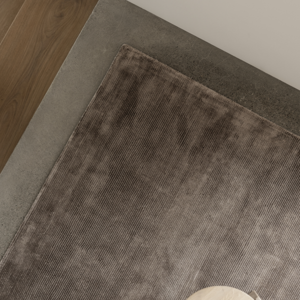 Cozy interior view featuring a soft rug on a modern floor.