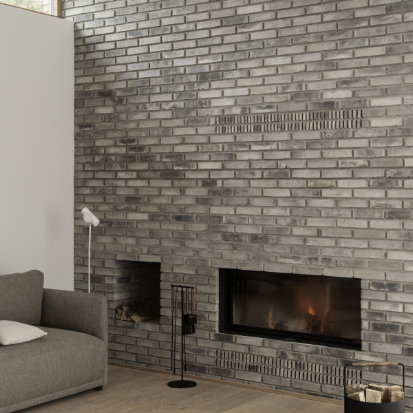 Modernes Wohnzimmer mit einem eleganten grauen Backsteinofen und minimalistischer Möbel.