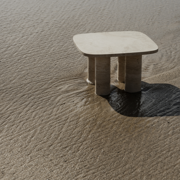 Minimalistischer Steintisch am sandigen Strand mit subtilen Wasserreflexionen.