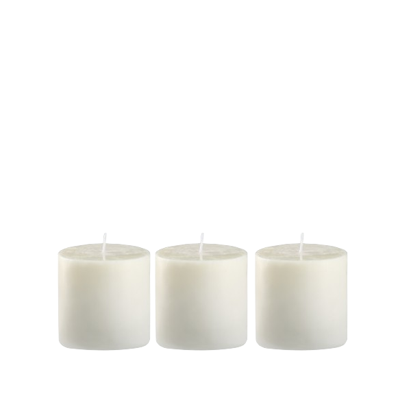 Three small white candles arranged in a row against a plain background.