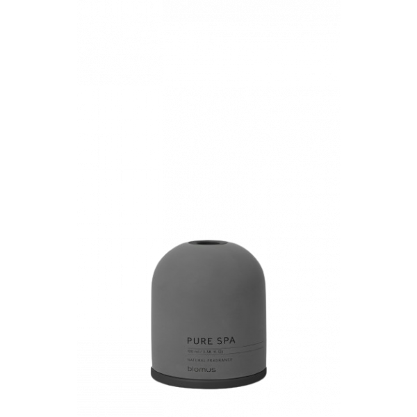 Stylischer grauer ätherischer Öldiffusor auf einem minimalistischen Hintergrund.