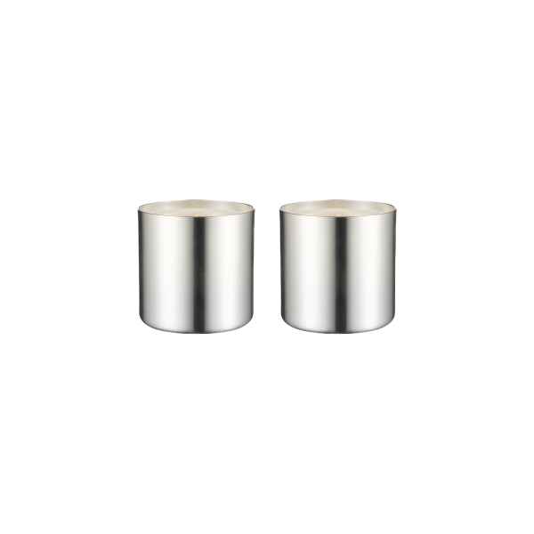Stylish metallic storage canisters with wooden lids for modern home organization.
