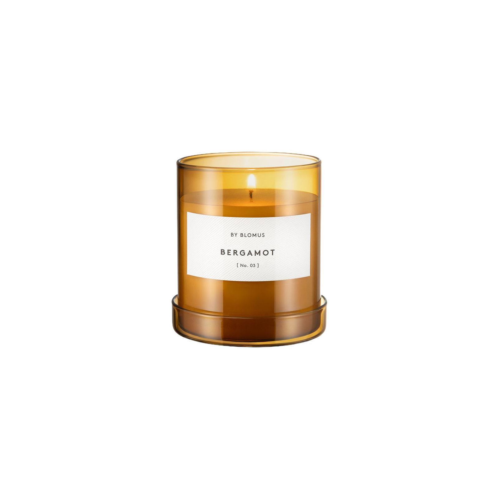 Bergamot Duftkerze von Blomus in einem eleganten Behälter aus amberfarbenem Glas.