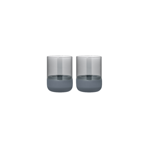 Pair of modern glass cups with gray bases for stylish beverage serving.