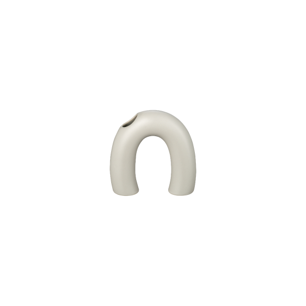 Elegant minimalist ceramic vase in a unique arch shape, perfect for modern decor.