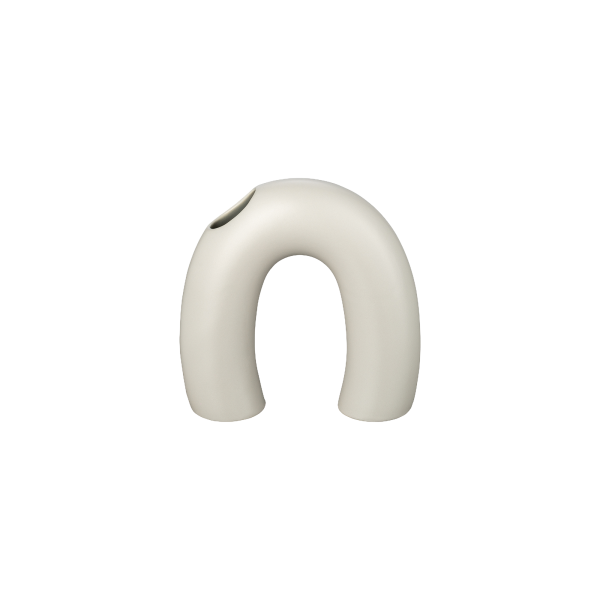 Minimalist cream arch vase with a unique design and single opening for flowers.