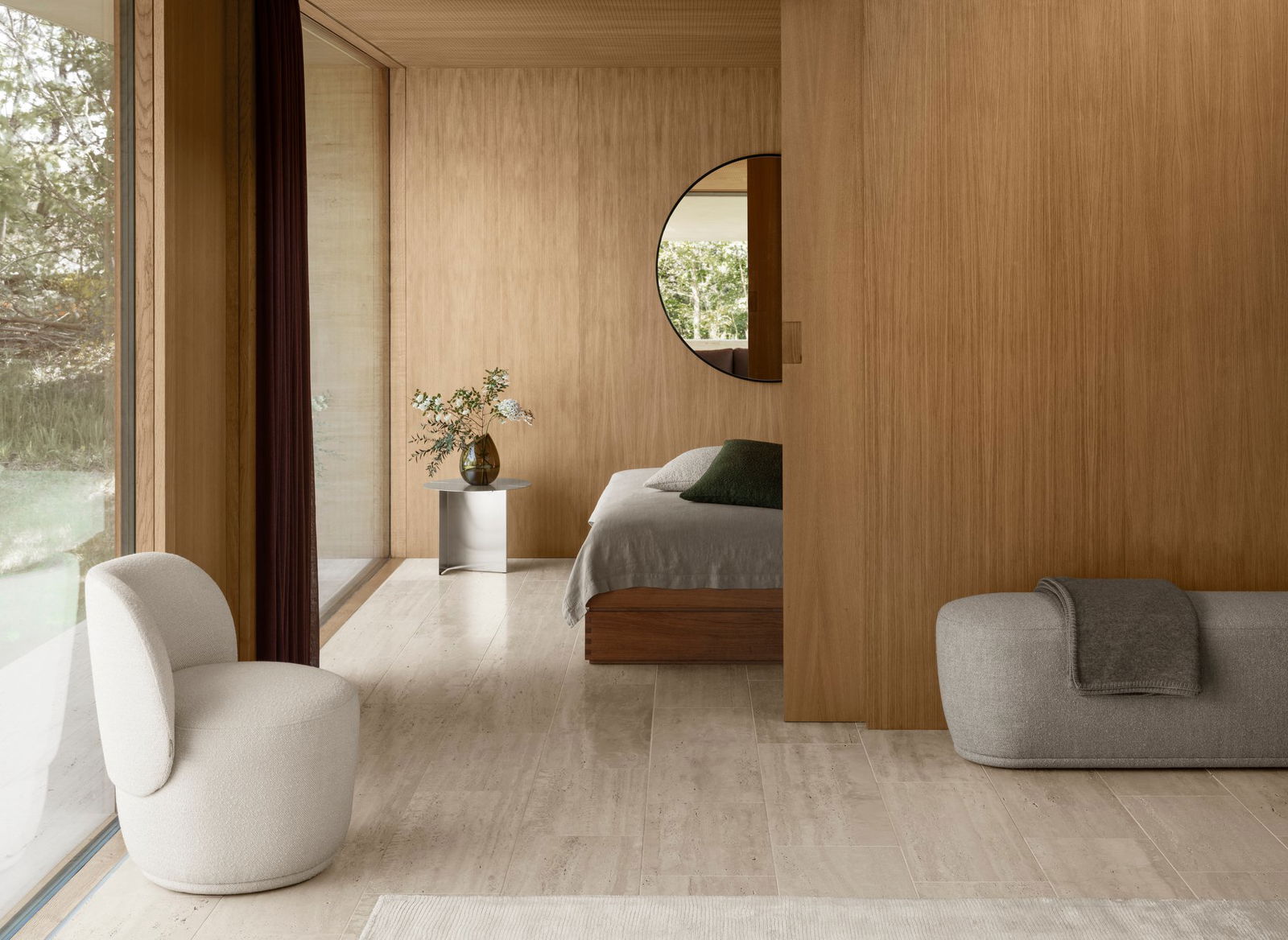 Modern bedroom interior with wooden walls, stylish furniture, and natural light.