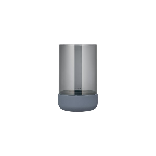 Minimalist glass vase with a sleek design and dark base for contemporary decor.