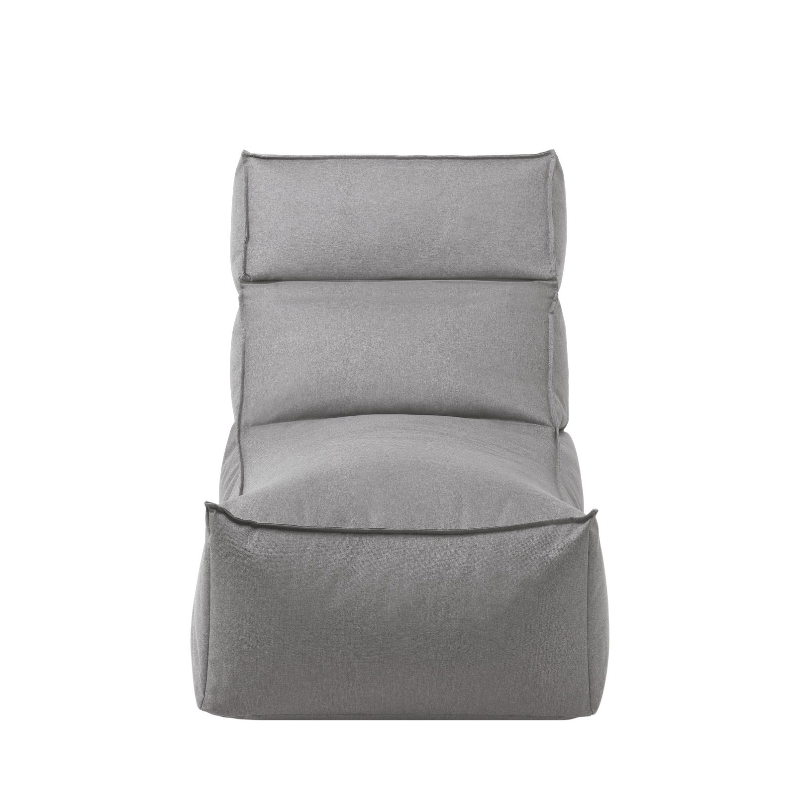 Cozy gray lounge chair with soft fabric and comfortable design on a black background.