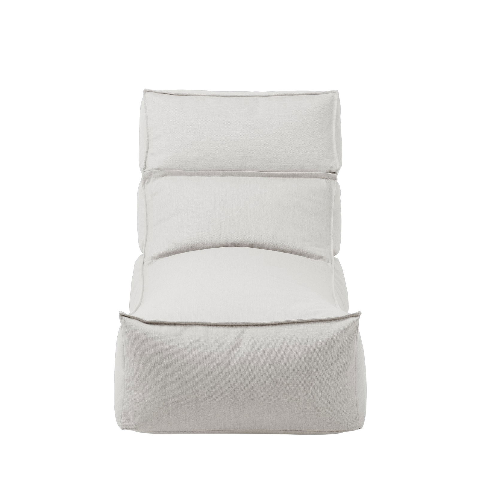 Cozy white lounge chair with a modern design on a black background.