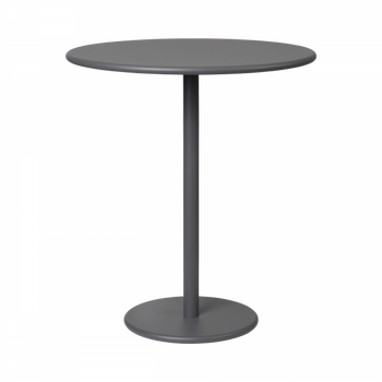 Modern round gray dining table with a sleek pedestal base on a black background.