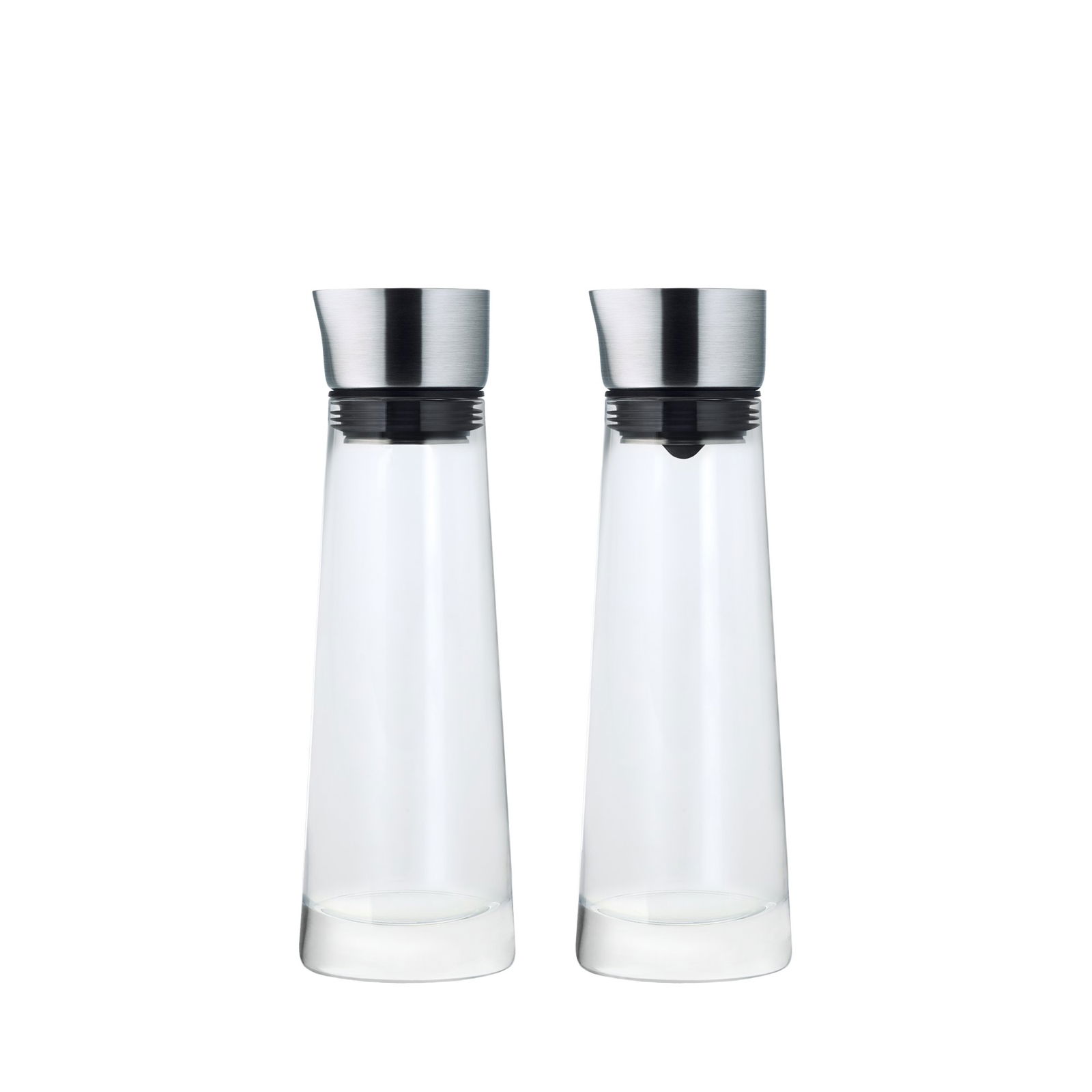 Two elegant glass carafes with stainless steel lids on a black background.