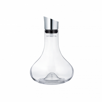 Elegant glass water carafe with a sleek metal spout against a black background.