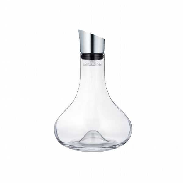 Elegant glass water carafe with a sleek metal spout against a black background.