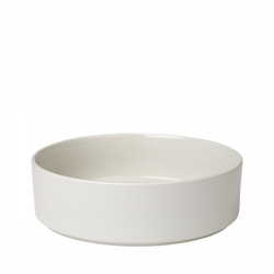 Elegant white ceramic bowl for serving dishes or decorative purposes.