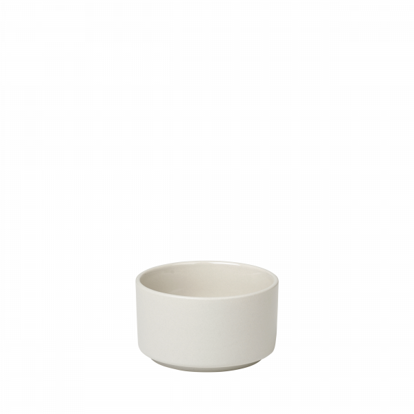 Simple ceramic bowl in a minimalistic design against a black background.
