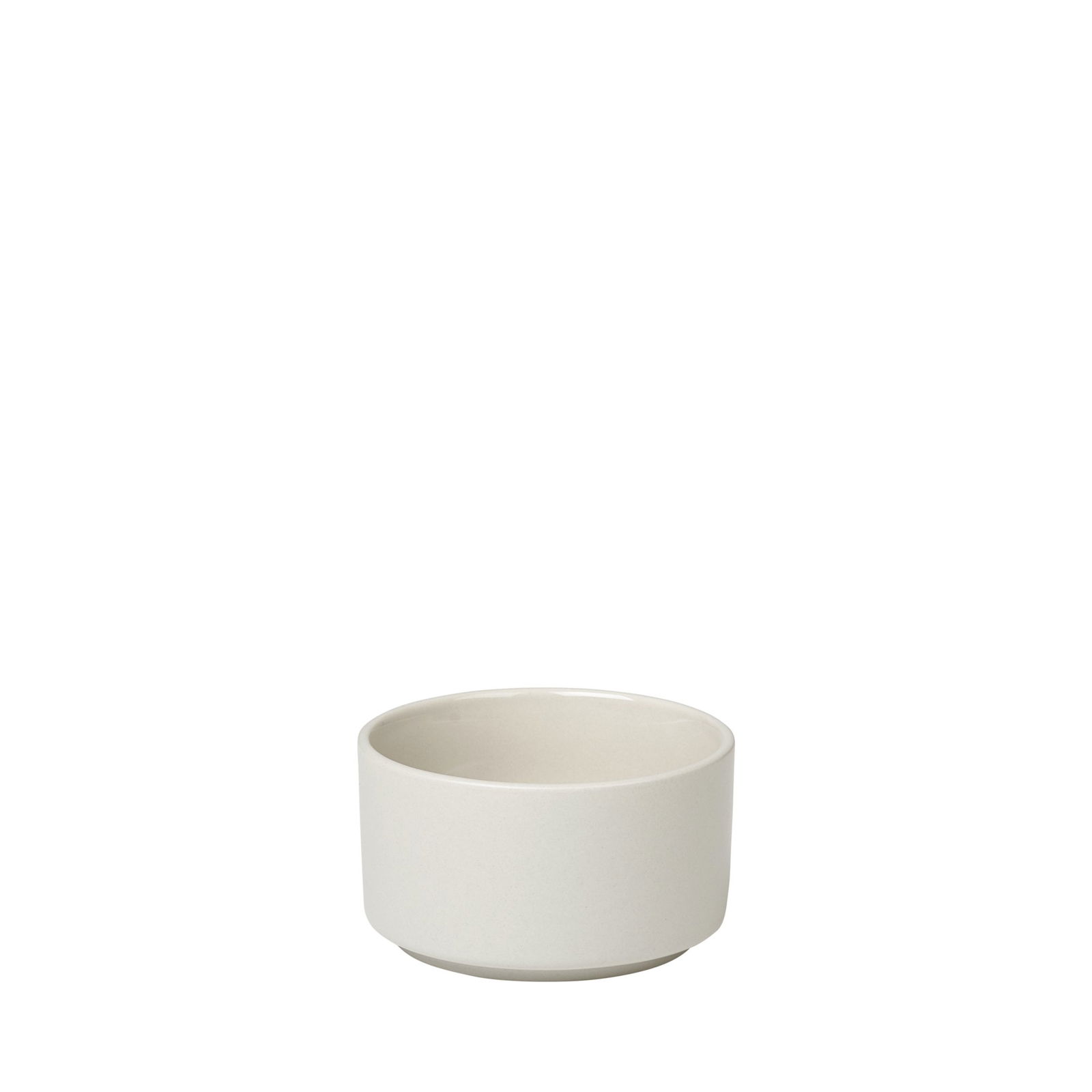 Simple ceramic bowl in a minimalistic design against a black background.