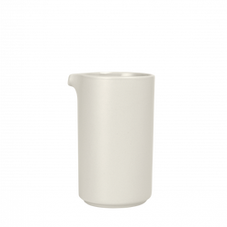 Minimalist white ceramic cup with a subtle lip, perfect for beverages or decor.