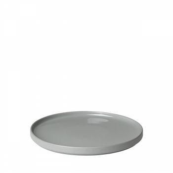 Minimalistische graue Keramikplatte auf schwarzem Hintergrund, ideal für moderne Esszimmerdekoration.
