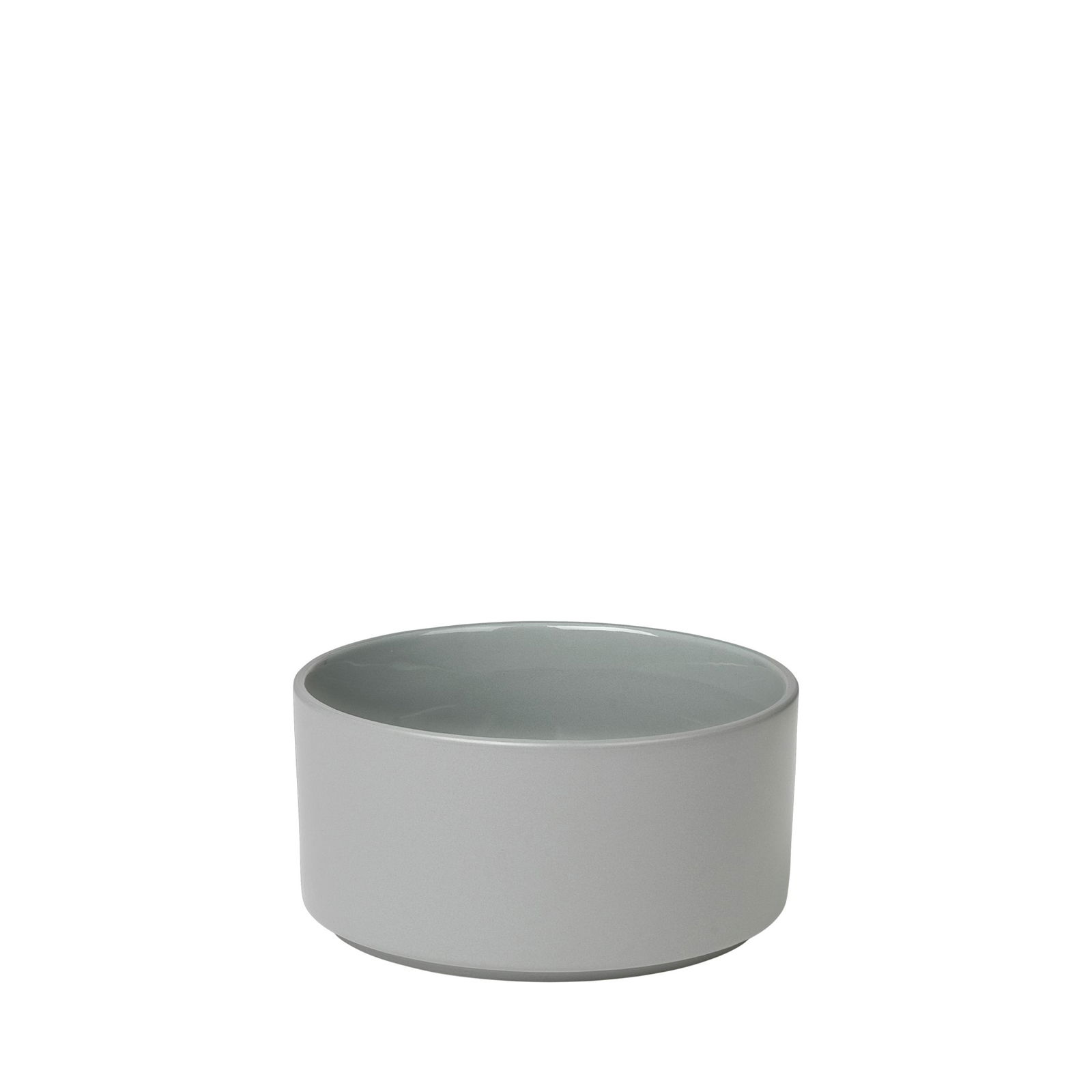 Minimalistische graue keramische Schüssel mit einem glatten, glänzenden Innenraum.