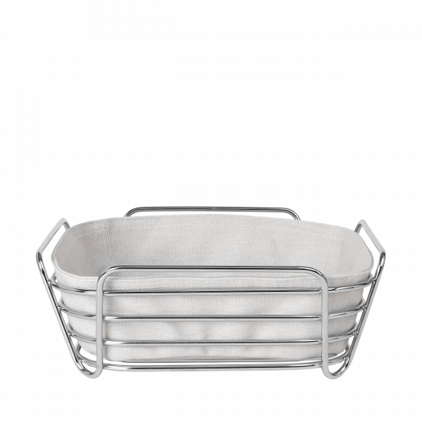 Stylish metal basket with a white fabric liner for home organization and decor.
